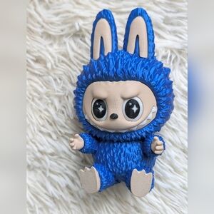 Blue and Tan Decorative Figurine